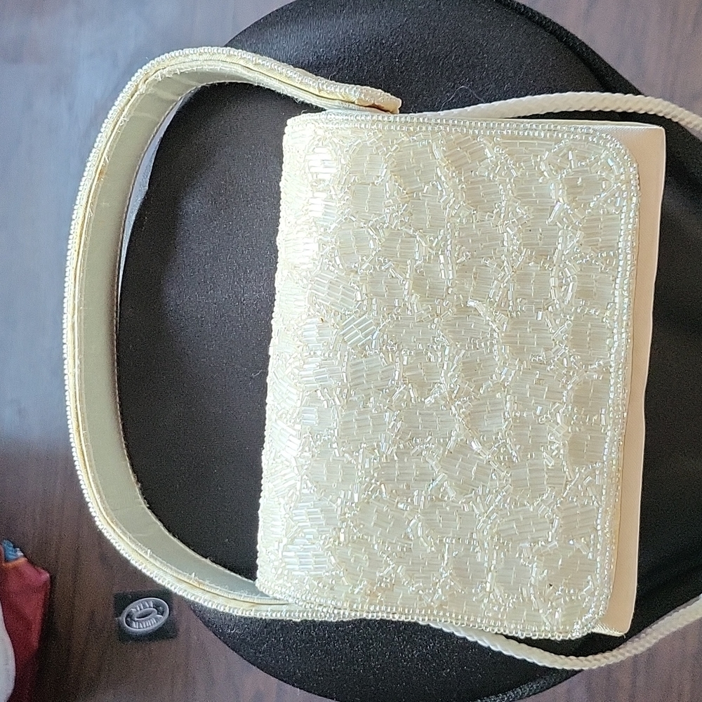 Sasha white hand bag.